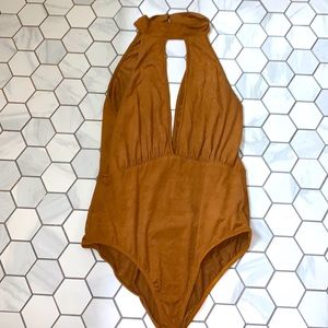 Plugging suede body suit
